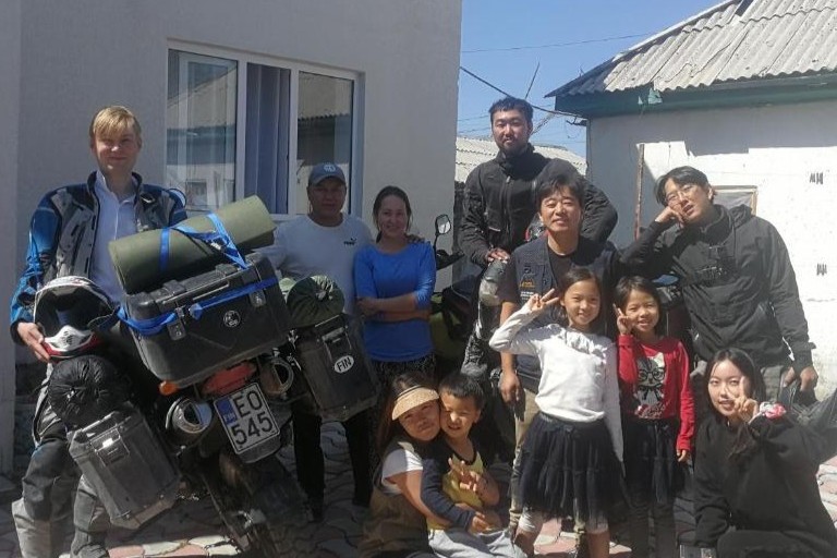 Motorbikers outside of Snow Leopard Hostel