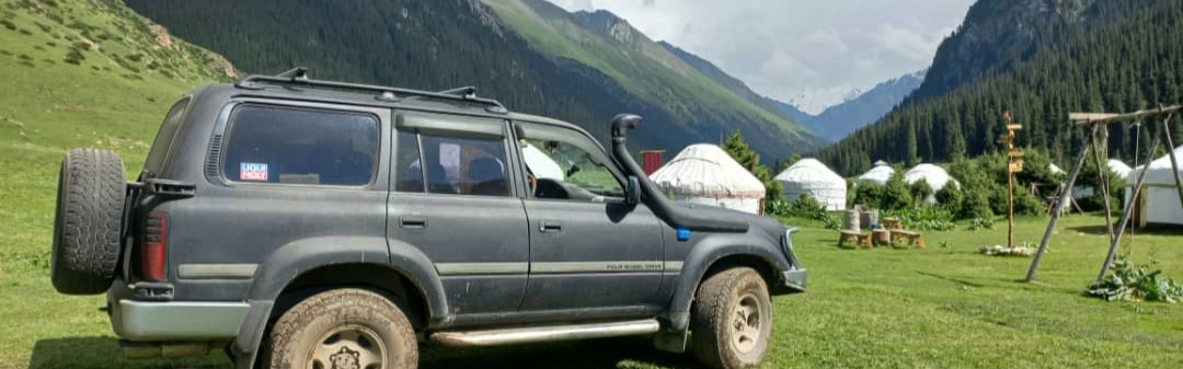 SUV parked in Altyn Arashan Resort